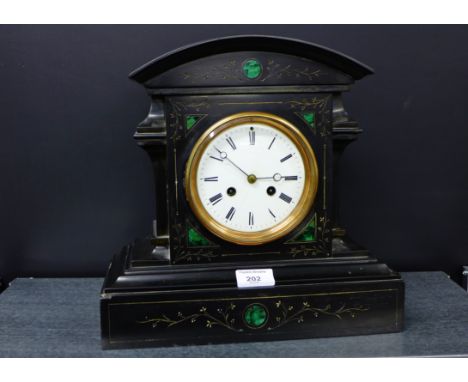 A Victorian black slate and malachite inlaid mantle clock of architectural form, the circular  enamel dial with Roman numeral