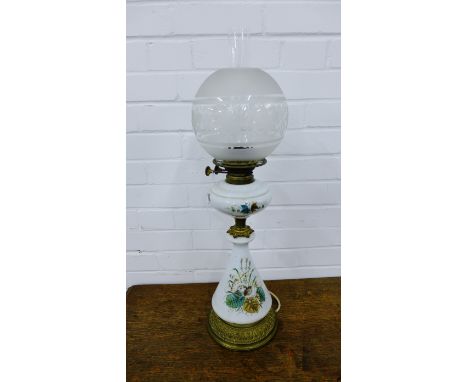 Birmingham Lamp Company opaque glass oil lamp base, painted with flowers and foliage, on a circular brass footrim with fruit 