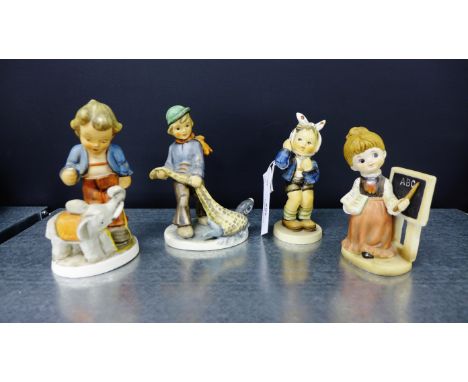 Goebels 'Boy with Toothache' figure, two Friedel hand painted figures and a Hummel style figure (4)