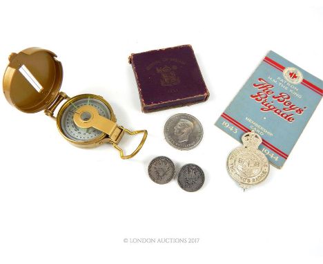 A Boys' Brigade membership card 1943-1944 with white metal Boys' Brigade Badge a lensatic compass; a Festival of Britain unci