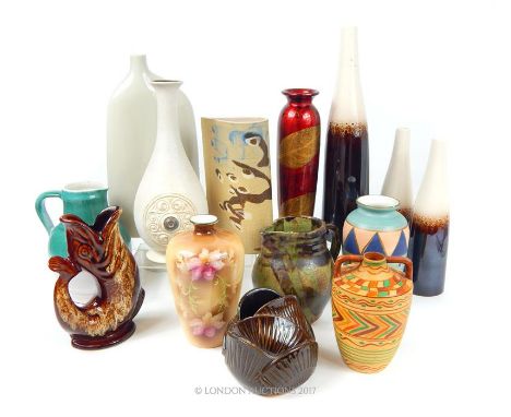 A collection of various ceramic vases and jugs, including a hand painted Jeff Banks 'Ports of Call' vase, a 'Wardle' vase, A 