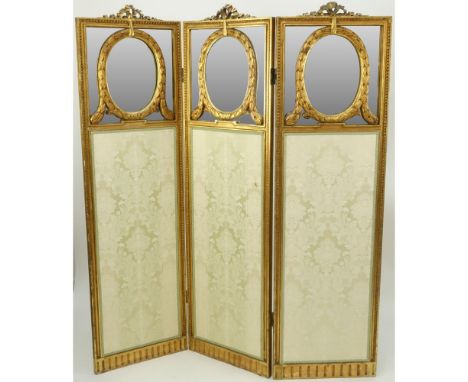 Early 20th Century French Giltwood Upholstered And Mirrored Three (3) Panel Screen. Unsigned. Surface wear, rubbing and a sma