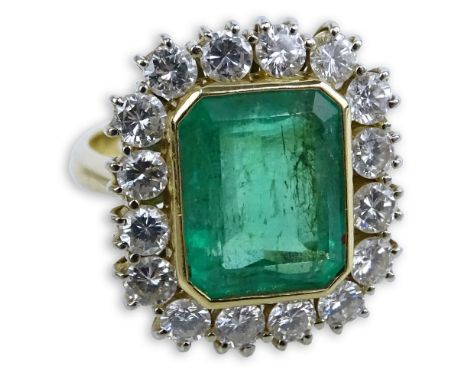 AIG Certified 5.09 Carat Rectangular Step Cut Emerald, 1.76 Carat Round Brilliant Cut Diamond and 18 Karat Yellow Gold Ring. 