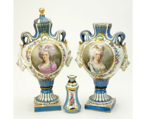 Pair of 19/20th Century French Sevres Louis XVI style Bleu Celeste Porcelain Covered Urns with Relief Swags, Double Loop Hand