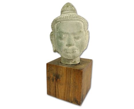 Vintage Thai Carved Stone Buddha Head. On wood block. Unsigned. Split on Stand or good condition. Measures 15-1/2" H. Provena