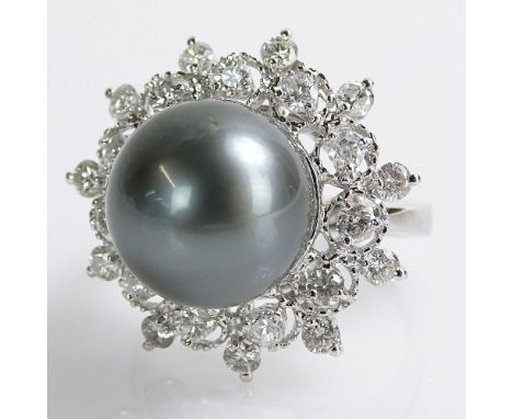 AIG Certified Tahitian Black Pearl, 1.18 Carat Round Brilliant Cut Diamond and 14 Karat White Gold Ring. Pearl measures 12.0m