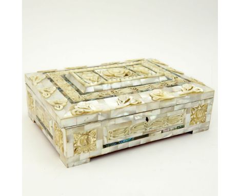 Vintage Carved Inlaid Mother of Pearl and Abalone Dresser Box. Unsigned. Minor losses and loose lid. Measures 3-1/2" H x 10-3