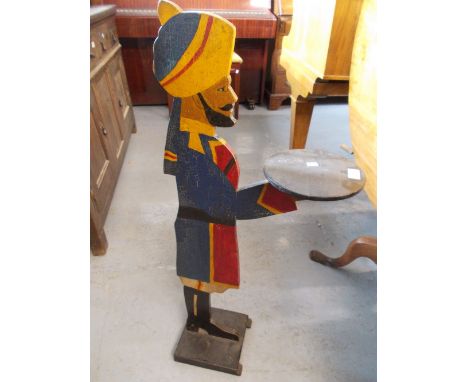 Painted wooden dumb waiter in the form of a figure wearing Indian army uniform together with a reproduction mahogany book sta