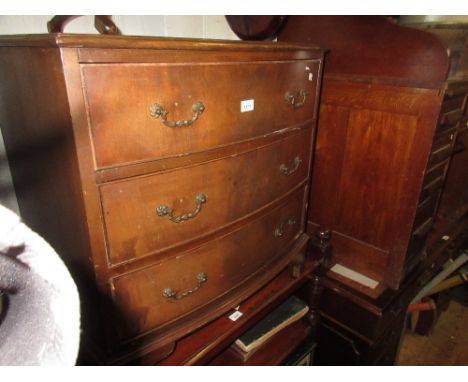 Reproduction mahogany three drawer bow front chest with brass handles and bracket feet 