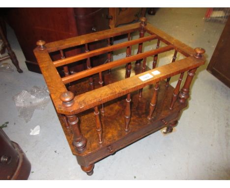 Victorian burr walnut three division Canterbury with turned spindles above a single drawer with knob handles, raised on turne
