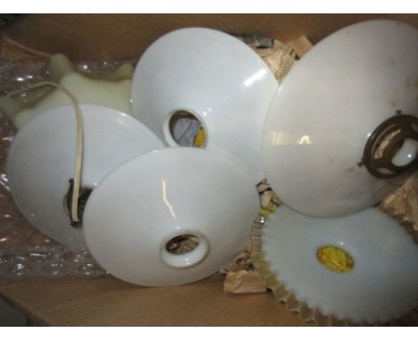 Four circular white opaque glass lamp shades 