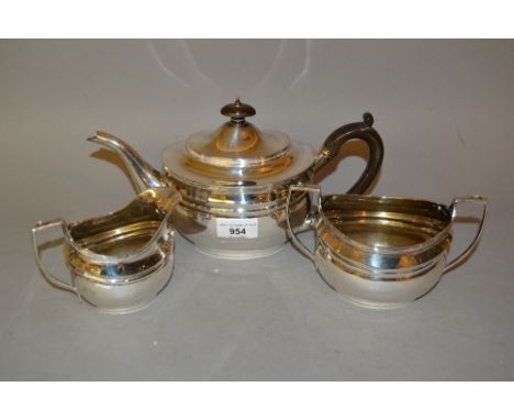 London silver three piece tea service of oval baluster form 