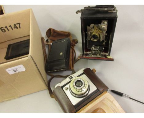 Tudor No. 6 plate camera by Albert Coe, Norwich, together with an Ilford 35mm camera and a bellows camera 