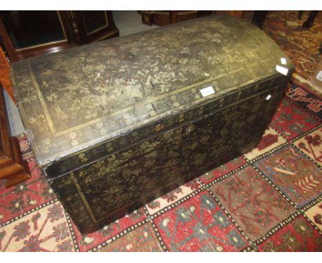 18th / 19th Century black lacquer dome top trunk with hinged lid and brass end carrying handles decorated with an all-over de