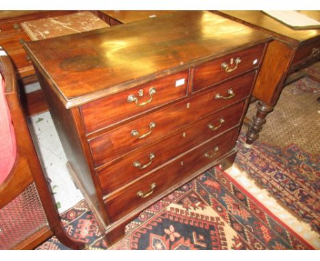 George III mahogany straight front chest of two short and three long graduated drawers with brass swan neck handles and brack