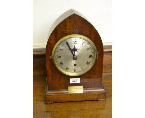 Early 20th Century mahogany lancet shaped mantel clock, the silvered dial with Roman numerals, signed Gardener, Preston with 