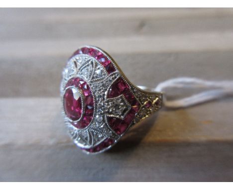 Platinum ruby and diamond dress ring 