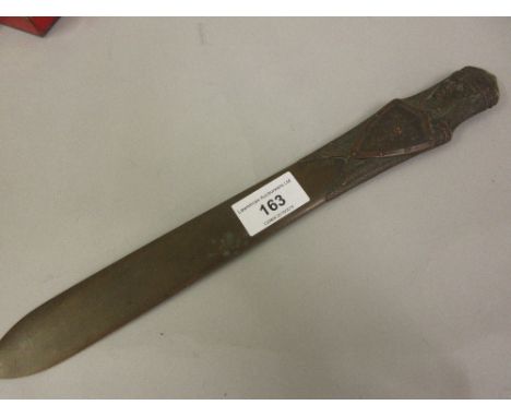 A. Dahl, an Art Nouveau bronze paper knife, the handle in the form of a knight wearing chain mail, signed in the bronze, 12.5