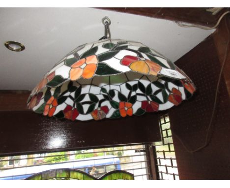 Tiffany style leaded glass lamp shade together with a wrought iron lamp standard with shade 