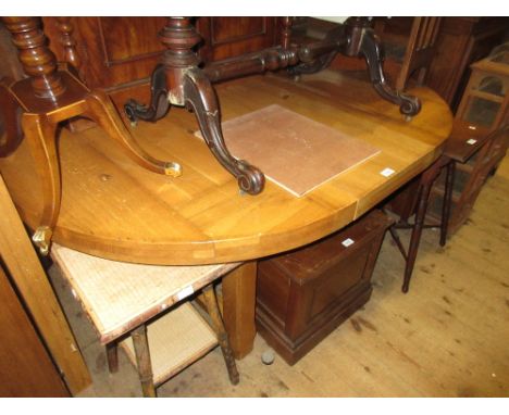 Modern French light oak circular extending dining table with two extra leaves together with a set of four matching ladder bac