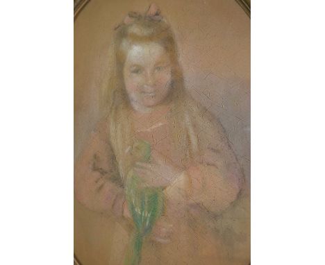 Large Continental oval pastel on card, portrait of a girl holding a parakeet, gilt framed 