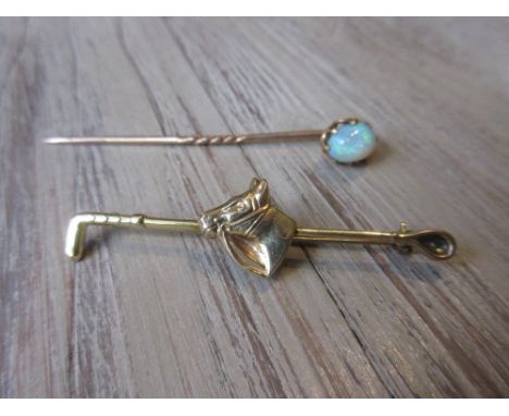 9ct Gold tie pin in the form of a horses head and whip together with a yellow metal and opal set tie pin 