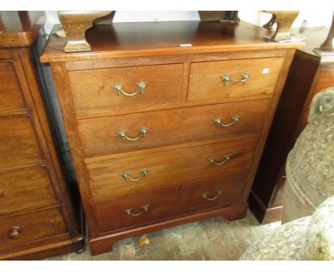 Early 20th Century mahogany chest having two short and three long drawers with brass handles and bracket feet 