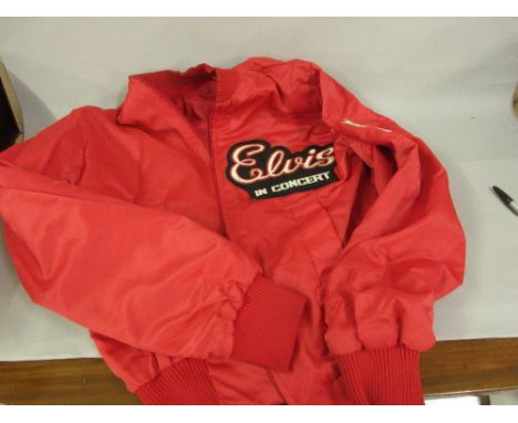 Elvis Presley in Concert tour jacket with T.C.B. embroidered badgeNo known provenance with this item. 