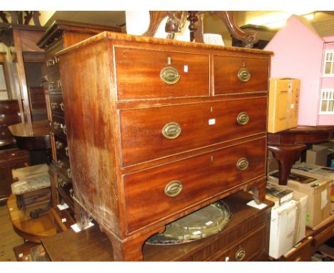 19th Century mahogany chest of two short over two long drawers with oval brass handles raised on bracket feet, 33ins high x 3