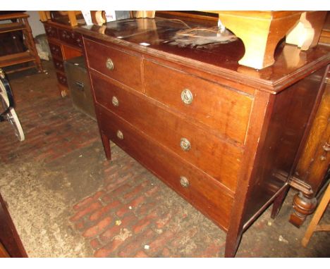20th Century mahogany dressing chest having two short over two long drawers with brass ring handles, on square tapering suppo