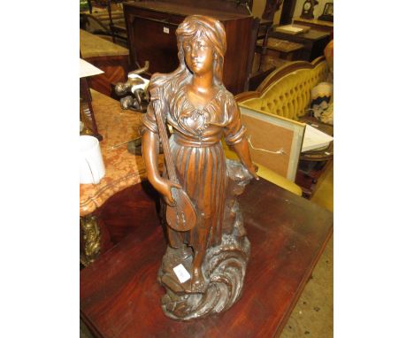 19th Century dark patinated bronzed figure of a woman playing a lute on a naturalistic base, 21ins highNo marks or names, jus