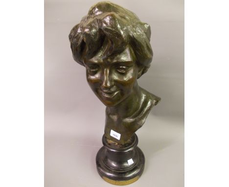 Jules Herbays patinated bronze bust of a young woman, signed in the bronze and mounted on a circular ebonised base, 22ins hig