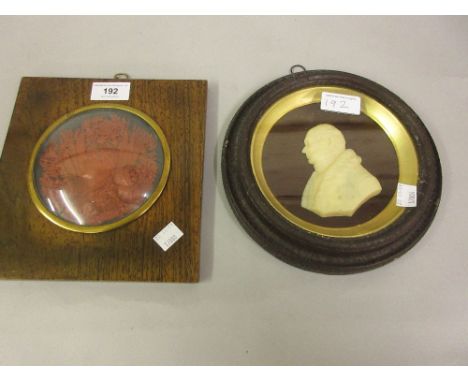 19th Century French red wax, relief profile portrait of Napoleon, housed in a rosewood frame, together with another circular 