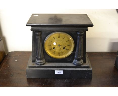 19th Century French black slate mantel clock, the circular engraved gilt dial with Roman numerals, the two train movement str