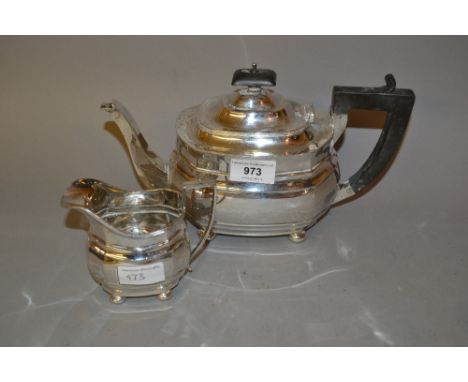 20th Century Chester silver teapot in Georgian style together with a similar Birmingham silver cream jug 