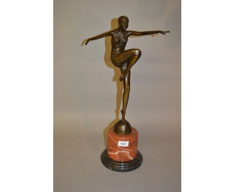 Reproduction Art Deco style dark patinated bronze figure of a girl dancer on a marble plinth, 22ins high approximately 