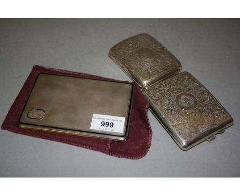 Rectangular silver black enamel and engine turned cigarette case, together with two other silver cigarette cases 
