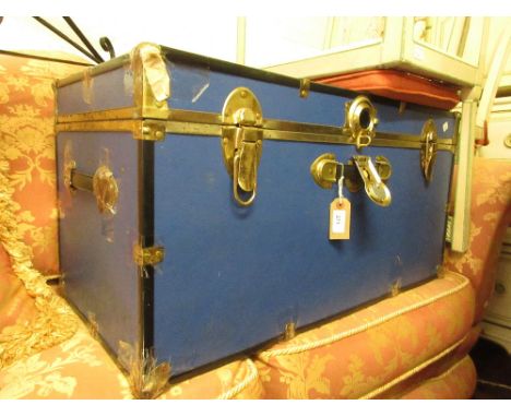 Metal mounted blue rexine travel trunk 
