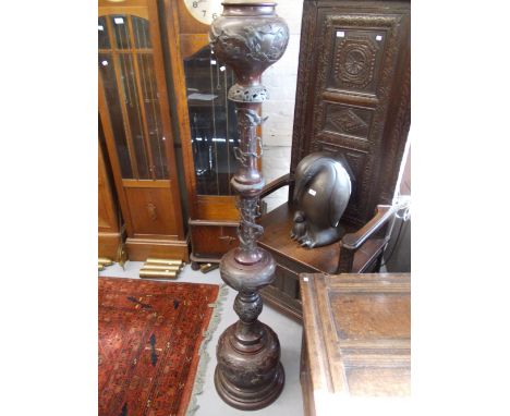 Large Japanese bronze baluster form lamp standard decorated in relief with birds and foliage, 66ins high 