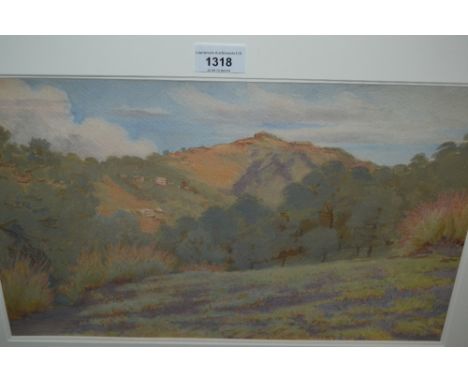 Lionel Heath, watercolour, landscape with distant hill side buildings, unsigned, 11ins x 17ins, gilt framed 