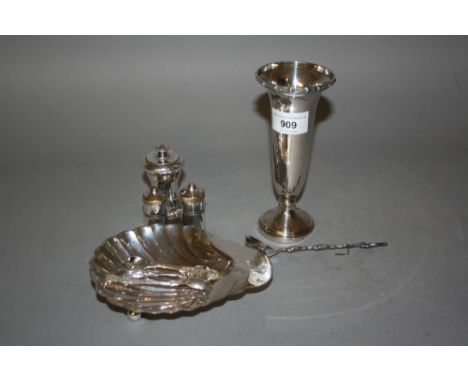 Birmingham silver spill vase, a small Finnish silver ladle, a plated shell form butter dish, two plated condiments and three 