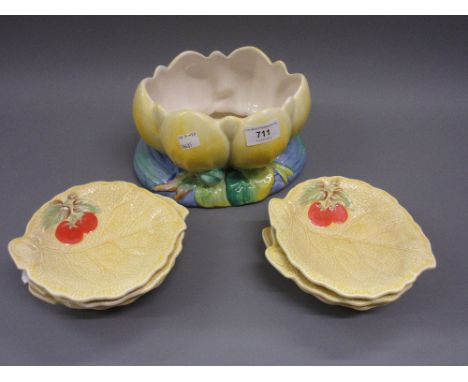 Clarice Cliff bowl in the form of a lily together with six matching leaf form dishes 