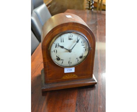 Edwardian mahogany line inlaid mantel clock having circular  dial with arabic numerals and two train movement striking on a g