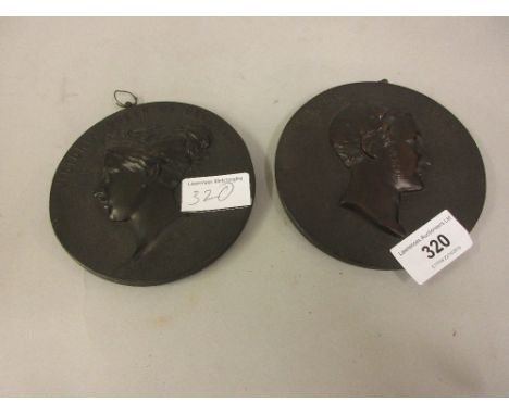 Pair of 19th Century French circular bois noici portrait plaques, Prince Albert and Queen Victoria 