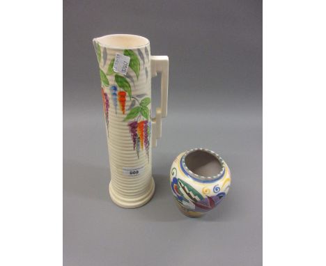 Art Deco Bewley pottery jug vase painted with flowering branches, together with a Poole Pottery floral decorated baluster for
