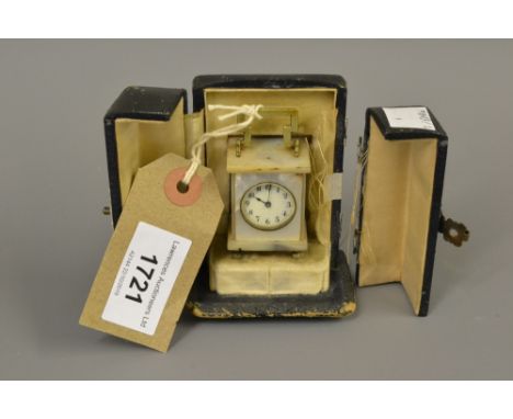 Cased miniature Mother of Pearl carriage clock (case at fault)not working 