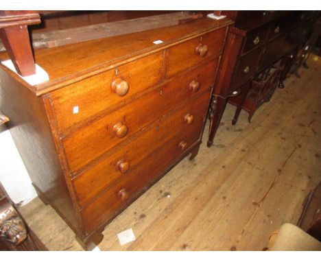 19th Century oak chest of two short and three long drawers with knob handles and bracket feet 