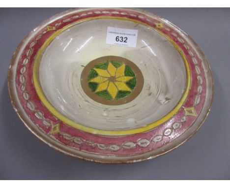 Della-Robbia, circular dish with incised and painted stylised decoration with a central star motif, incised marks to the base