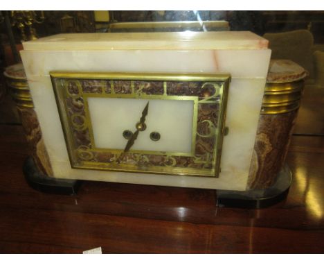 Art Deco marble and gilt metal mounted mantel clock with square dial, having Arabic numerals and two train movement striking 