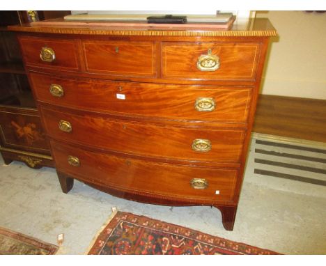 Late George III mahogany and boxwood line inlaid bow front chest of three short and three long graduated drawers with brass h